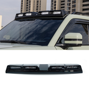 Custom-designed 4-LED roof light for BYD Leopard 5 with bright white illumination and sleek gloss black finish, enhancing visibility and style.