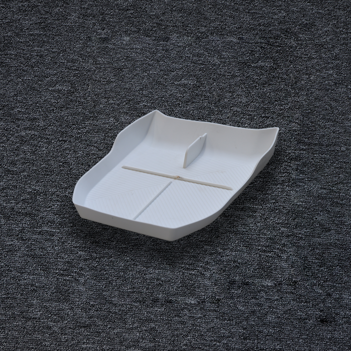 Premium wireless charging pad for Jetour G700, sleek anti-slip design, keeps devices secure and charged.