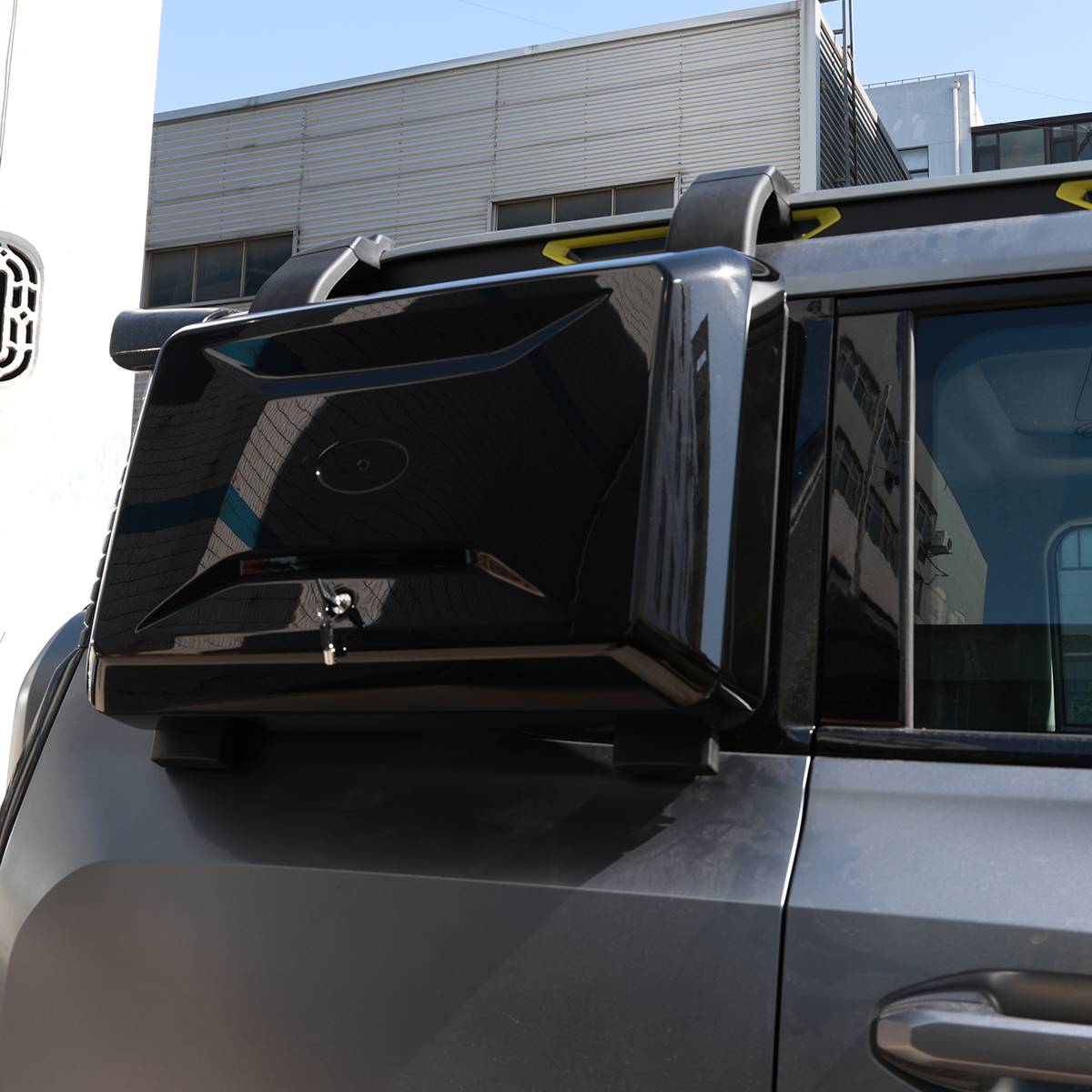 Rear view of Jetour T2 with trunk storage box installed, showing custom fit