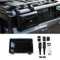 Jetour T2 trunk storage box installed, side view, showing sleek gloss black finish